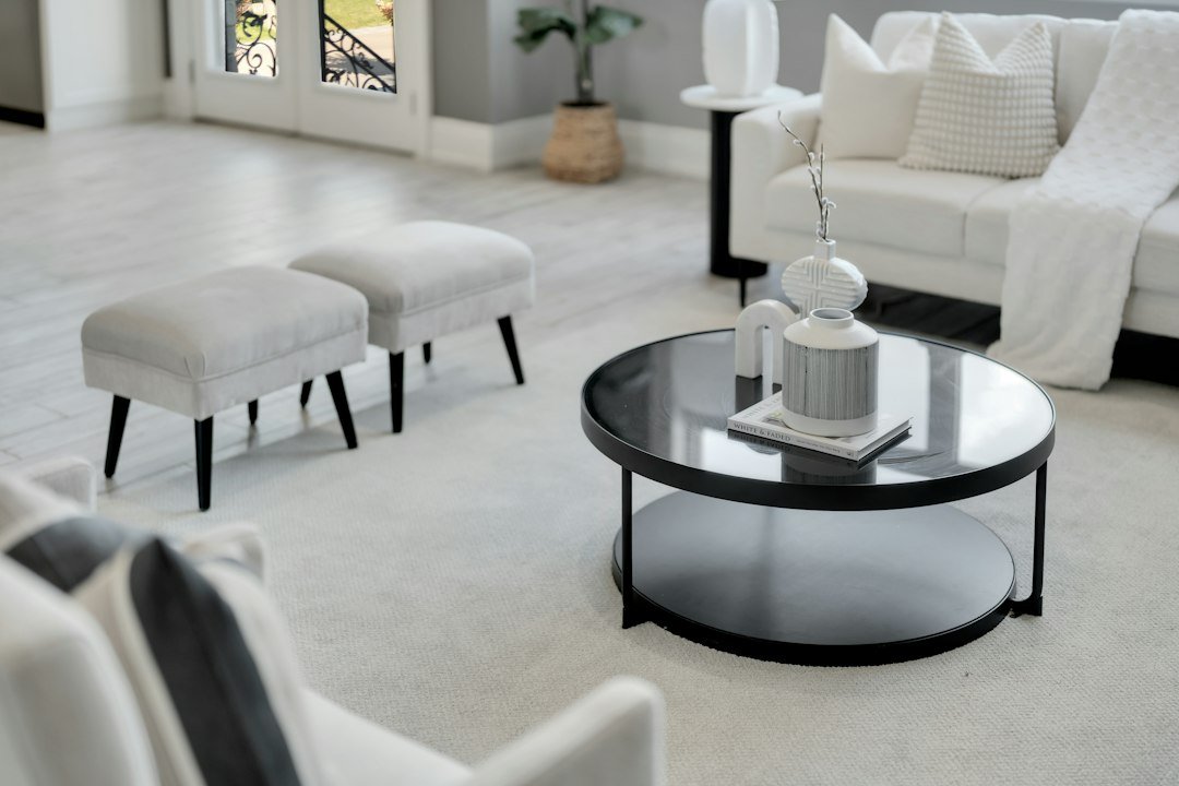 Modern living room with white sofa and round coffee table